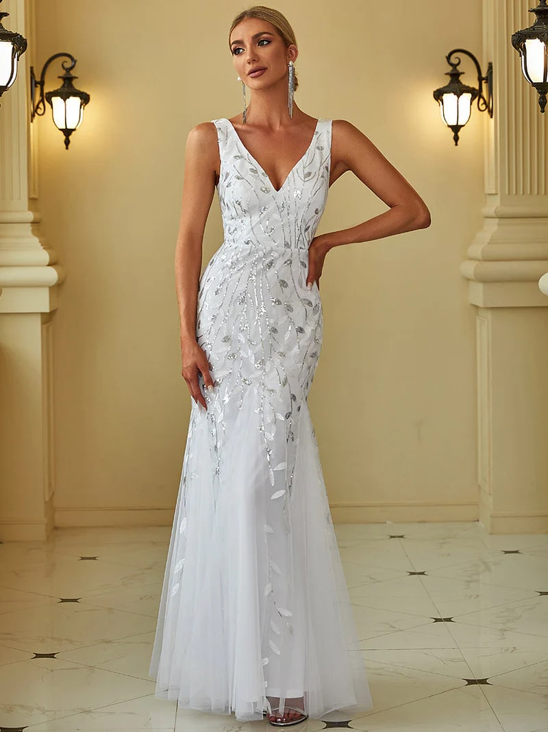White wedding dress with fishtail and sequins.